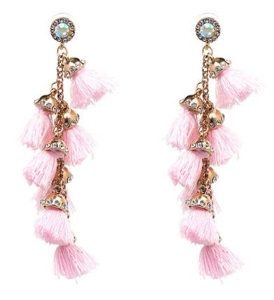 A multi layered busy tassel drop in bright bold colouring, complimented by gold and diamonte clasping. Bright and fun!