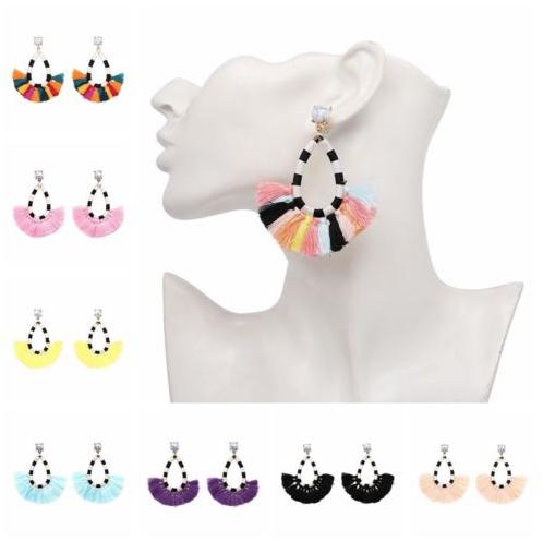 A gorgeous, fun and lightweight tassel drop earring in fun colours.  Each pair has a alternate stripe cotton frame affixed to a faux marble stud with a gold clasp.  Perfect for everyday wear.