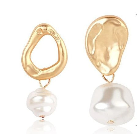 Charmaine's irregularity makes her the ultimate statement pearl earring.