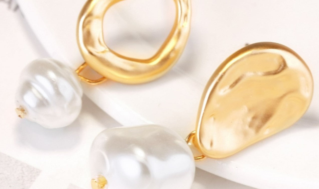 Charmaine's irregularity makes her the ultimate statement pearl earring.