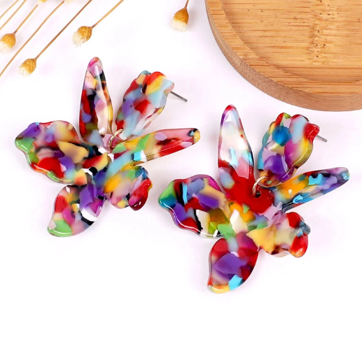 Caity earrings are our lightweight acrylic flower drop earring. With a stud top and beautiful colourful geometric petals, Caity is sure to make your outfit pop! All earrings arrive beautifully packaged in our luxurious Entire Me pouch.