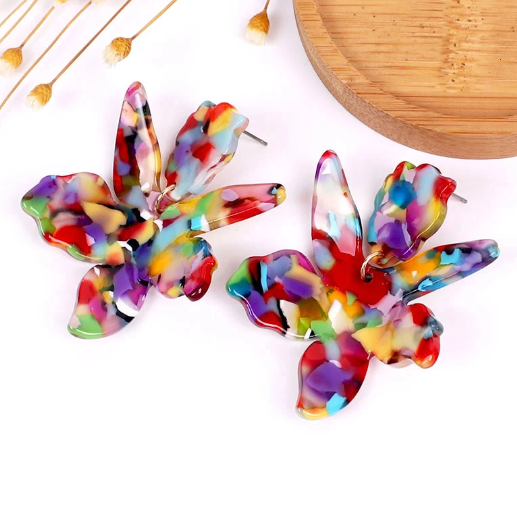 Caity earrings are our lightweight acrylic flower drop earring. With a stud top and beautiful colourful geometric petals, Caity is sure to make your outfit pop!  All earrings arrive beautifully packaged in our luxurious Entire Me pouch.
