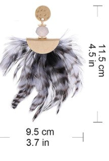 Hope is your go to retro elegant feather statement earrings. With a gold alloy dangle, securing to a bead for that added wow.