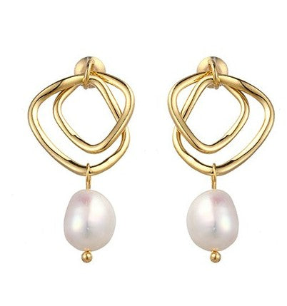 Rosie is our geometric pearl drop earring, with stud backing. You will not even notice you are wearing our Rosie earrings.