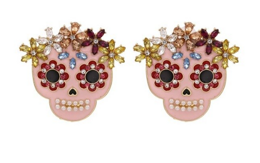 Who said skulls can't be feminine?  Our pink skull stud statement earrings are a must for that weekend BBQ or getting the office talking!
