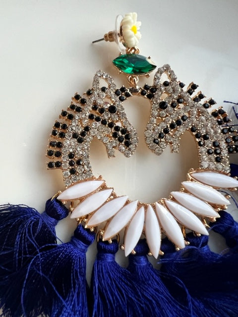 For the horse enthusiast, Tiffany is a vibrant combination of crystals and tassels. The ultimate fun statement earring. Care is required to maintain the tassel shape, trimming of tassels may be required with wear. Tiffany is a heavier style of earing, suitable for event wear.