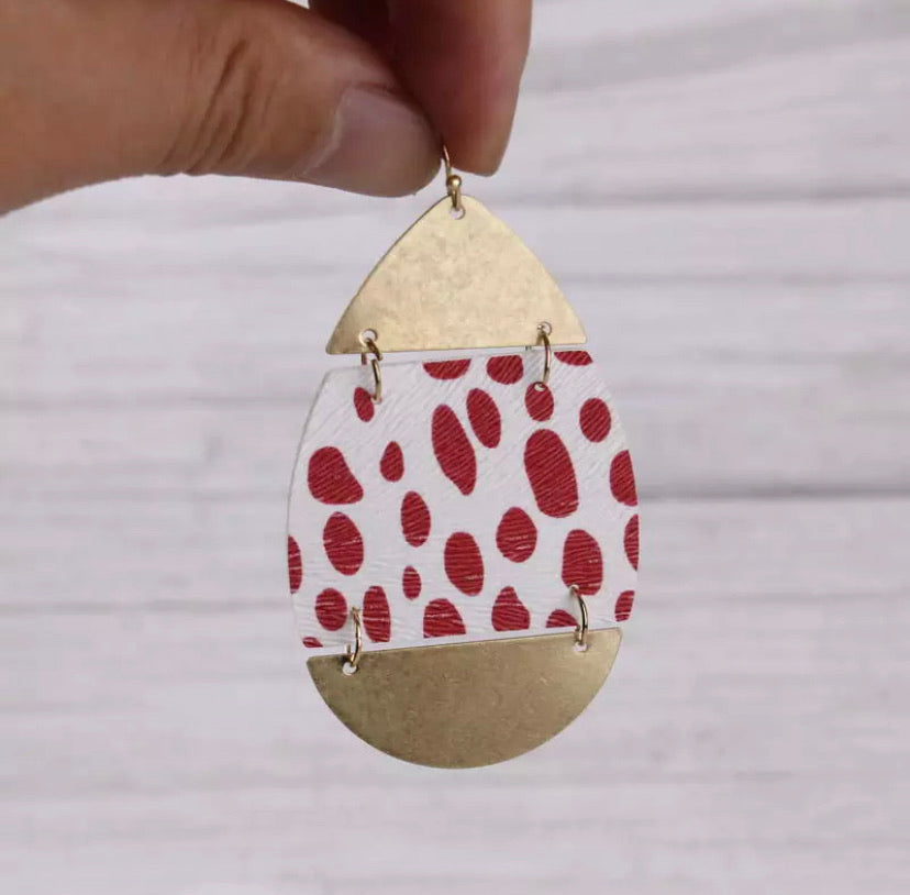 A gold faux hide oversized drop in a fun, colourful design and super lightweight for all day.