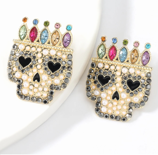 Beaded Skull Earrings. Hand-crafted with rhinestone and pearl beads, they capture classic style with a modern twist.