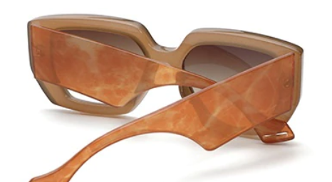 bold and fashionable oversized frame in a Brown hue, these statement sunglasses offer UV400 protection and come with a complimentary Entire Me carry case.