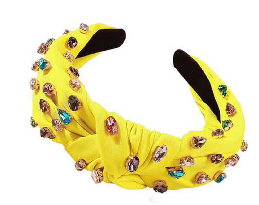 Add some glitz to your everyday look with the classic vibrant yellow turban middle Knot & Rhinestone Headband from Entire Me. This stylish headband fuses multicolored, hand-stitched rhinestones with a statement middle knot, providing remarkable sparkle for any occasion. The wide frame ensures all-day comfort and a secure fit.