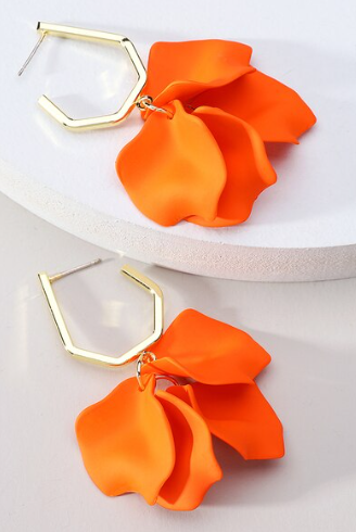 Crafted from acrylic and fastened with a secure stud backing, these chic vibrant orange petal flowers are a statement on their own.