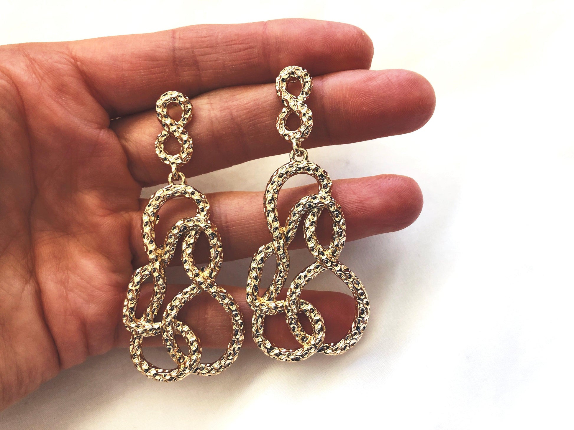 A twisted gold abstract drop. Versatile and very lightweight.