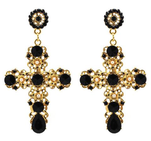 A gold coloured filigree cross with crystal embellishments and tiny faux pearl flower pieces.