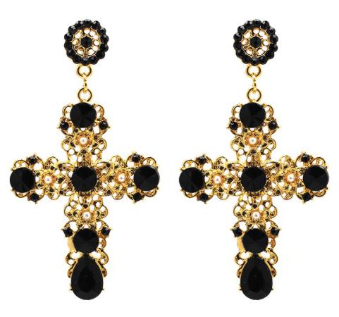 A gold coloured filigree cross with crystal embellishments and tiny faux pearl flower pieces.