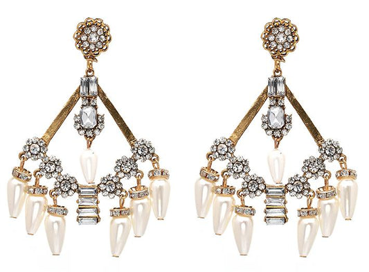 A floaty feminine design in faux pearl and crystals.   