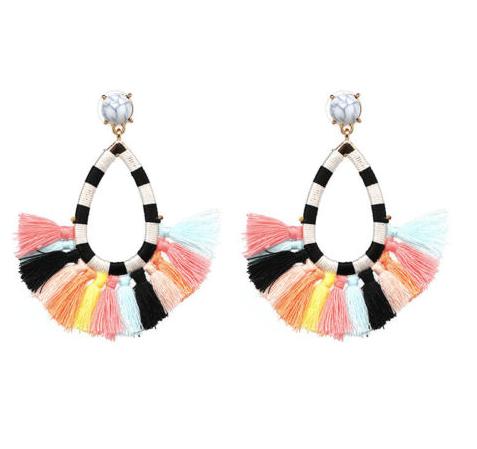 A gorgeous, fun and lightweight tassel drop earring in fun colours.  Each pair has a alternate stripe cotton frame affixed to a faux marble stud with a gold clasp.  Perfect for everyday wear.