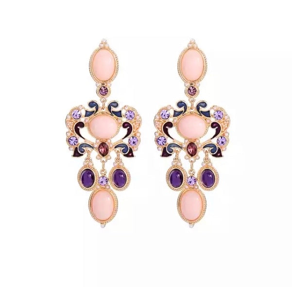 A vintage inspired glamour. Tones of pink, purple and gold with miniature pearl beading.