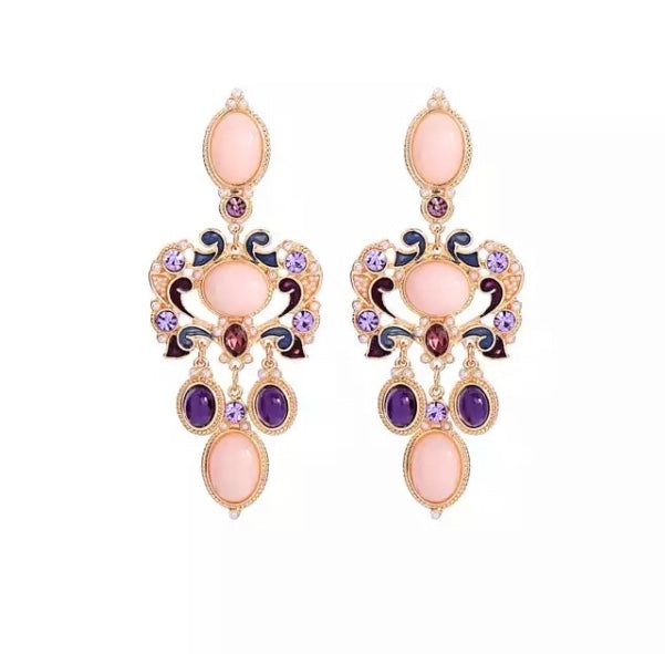 A vintage inspired glamour. Tones of pink, purple and gold with miniature pearl beading.
