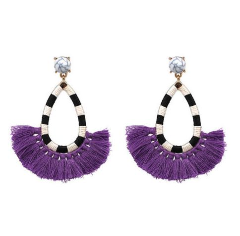 A gorgeous, fun and lightweight tassel drop earring in fun colours.  Each pair has a alternate stripe cotton frame affixed to a faux marble stud with a gold clasp.  Perfect for everyday wear.