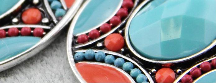 Beautifully coloured resin beaded earrings set out in a tiered teardrop design.  