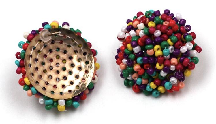 A multi-beaded stud made of tiny resin beads.