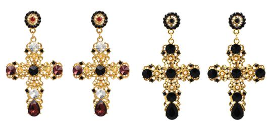 A gold coloured filigree cross with crystal embellishments and tiny faux pearl flower pieces.