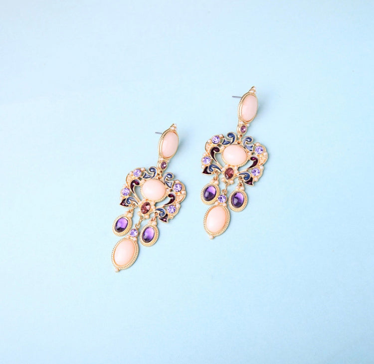 A vintage inspired glamour. Tones of pink, purple and gold with miniature pearl beading.