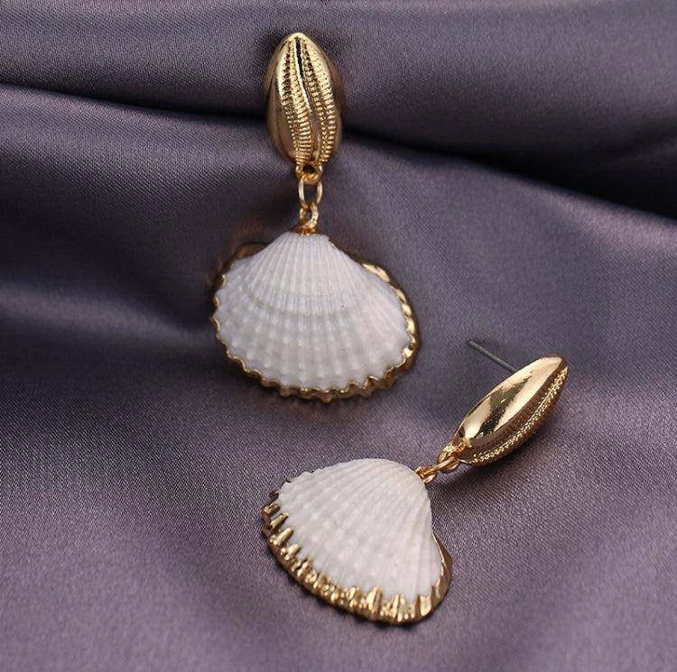 A lightweight open shell drop with gold detailing. 