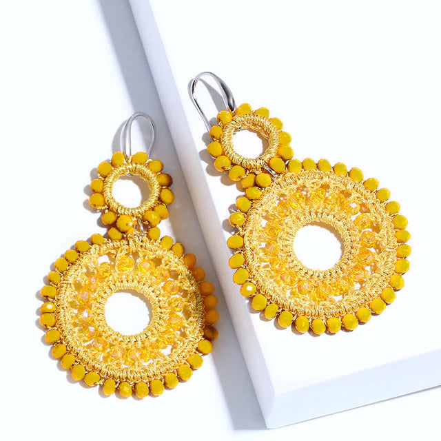 yellow cotton fringed beaded pendant statement earrings.