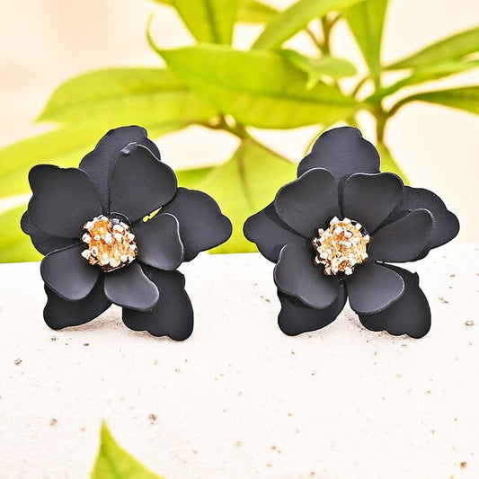 Carey is a delicate small flower cluster stud backed statement earring, available in either Black or Vibrant green, both with gold flower throats.  All earrings arrive beautifully packaged in our luxurious Entire Me pouch. 