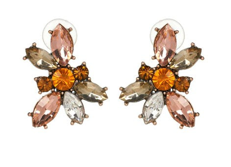 Cindy is a beautiful and simple crystal statement earring, shaped between a flower and butterfly stud design. Easily worn to dress up any outfit or add a little sparkle.