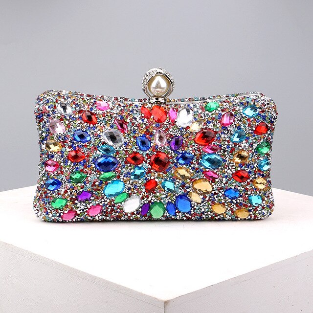 Are you Formal Ready?  This Gorgeous Crystal clutch is sure to make a statement in your outfit. With Vibrant colour crystal and a pearl statement.  Free Shipping on all orders over $85