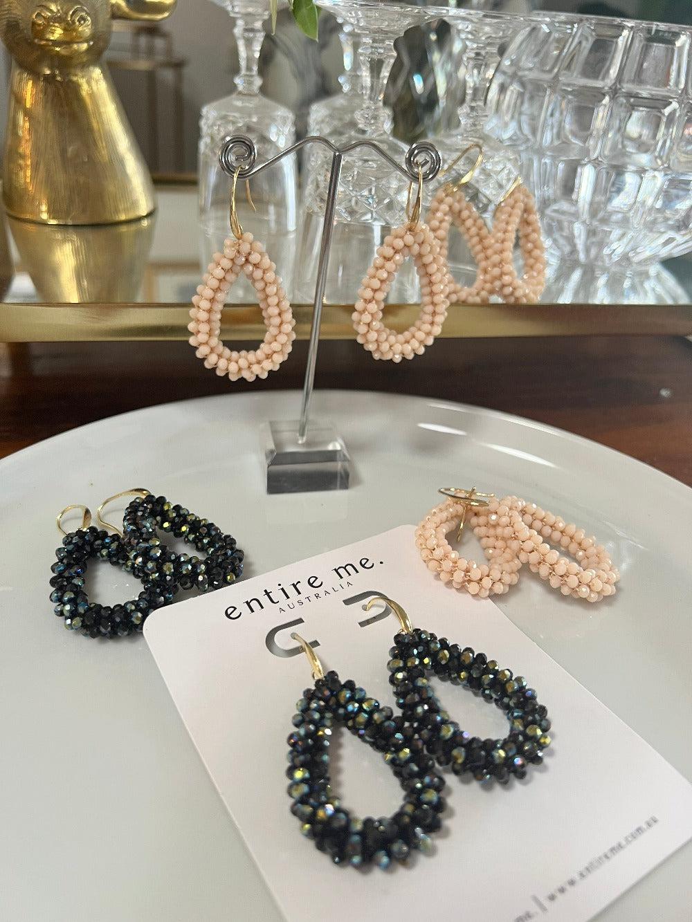 Our Crystal beaded long drop earrings will glisten where ever you go. 