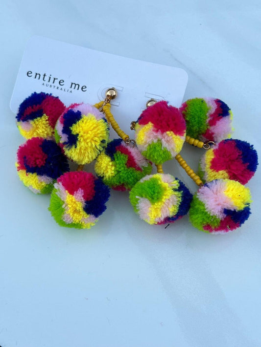 Crazy fun pom pom love. Seriously what's not to love about this beauty, with five yellow fabulous beaded stands each attaching to multicoloured pom poms.  Light weight earring for a day in the office, that will see you into the evening.