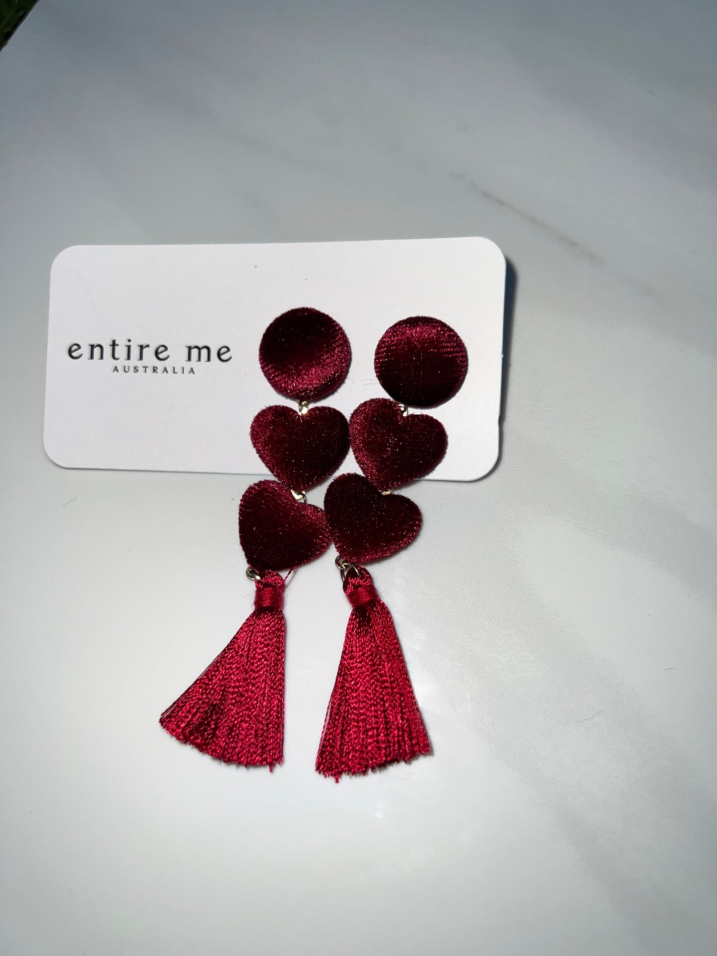 Fabulous velvet port wine love heart drop earing with ruby red tassel.  Gold backing detail.   Care is required to maintain tassel shape. 