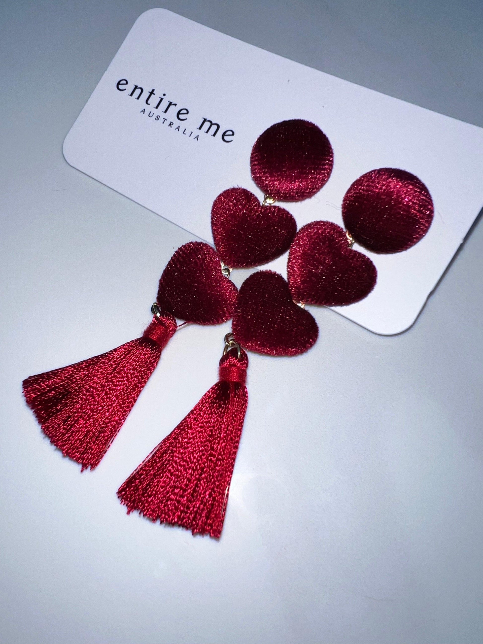 Fabulous velvet port wine love heart drop earing with ruby red tassel.  Gold backing detail.   Care is required to maintain tassel shape. 