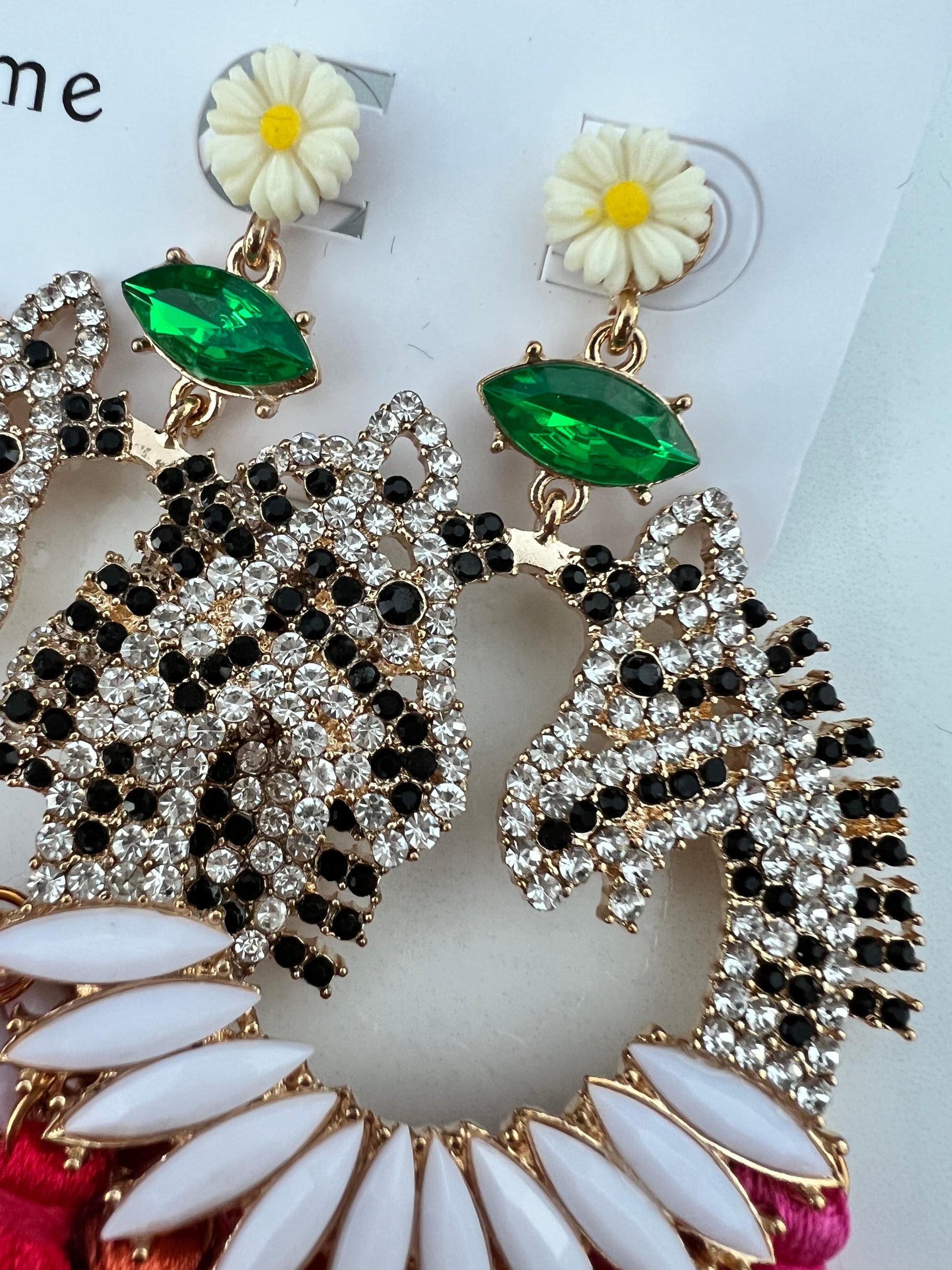 For the horse enthusiast, Tiffany is a vibrant combination of crystals and tassels.  The ultimate fun statement earring.   Care is required to maintain the tassel shape, trimming of tassels may be required with wear.  Tiffany is a heavier style of earing, suitable for event wear.  