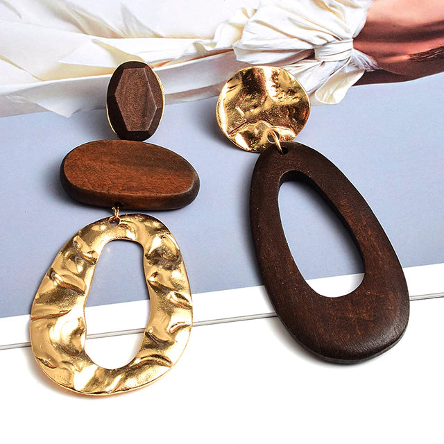 We love the new metal and timber combination with our show stopping Judy drop statement earrings.