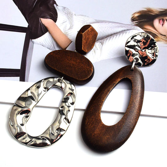 We love the new metal and timber combination with our show stopping Judy drop statement earrings.