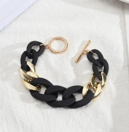 These fun geometric acrylic link chain bracelets with gold colour toggle clasp are sure to be a conversation starter.