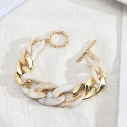 These fun geometric acrylic link chain bracelets with gold colour toggle clasp are sure to be a conversation starter.