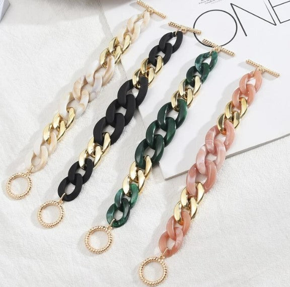 These fun geometric acrylic link chain bracelets with gold colour toggle clasp are sure to be a conversation starter.