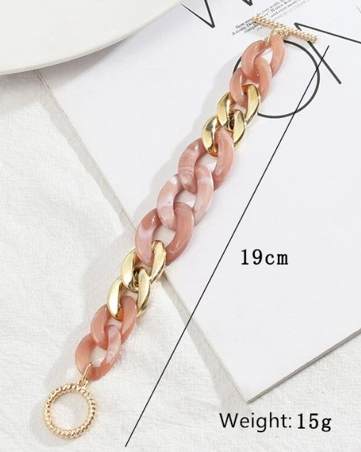 These fun geometric acrylic link chain bracelets with gold colour toggle clasp are sure to be a conversation starter.