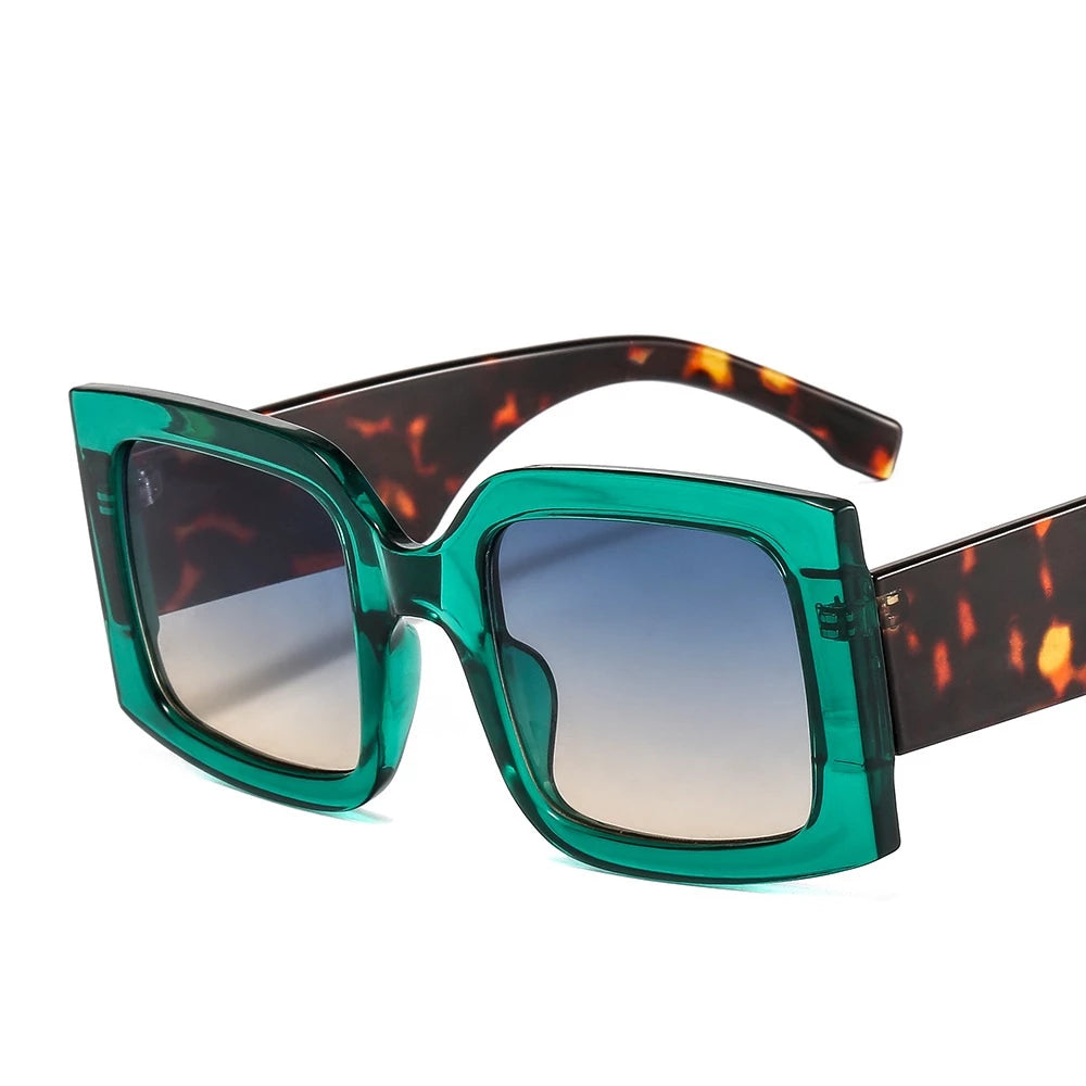 Green vintage oversized square sunglasses. Perfect styling with your favorite vintage tee and washed denim.   Sunglasses are onesize and come with an Entire Me carry case.  Frame: Polycarbonate  Lense Optical: Photochromic, UV400