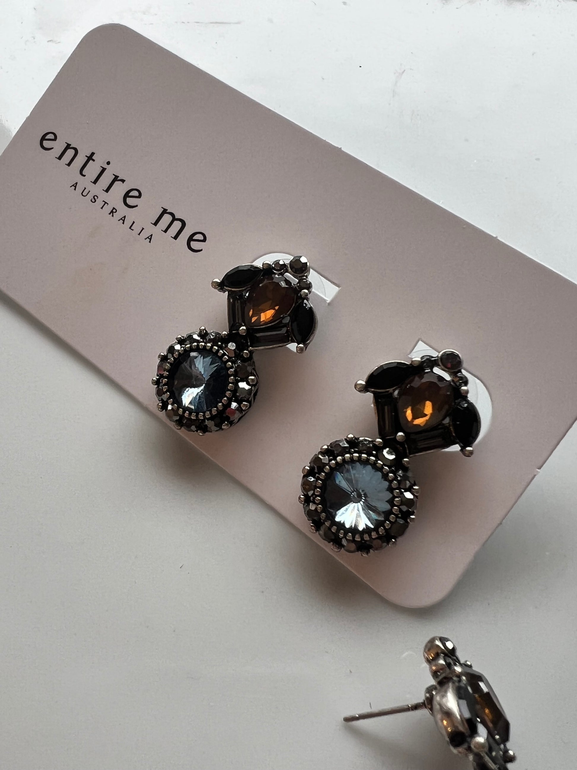 Our elegant small stud crystal drop earrings, in tones of burnt orange, black and the most divine blue.