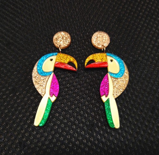 You can't beat a pair of statement earrings to bring a bit of joy and pizzazz to any outfit - even if its grey and miserable outside. Our Parrot acrylic dangle earrings are sure to dazzle.   All earrings come beautifully packaged in our Entire Me luxurious pouch. 