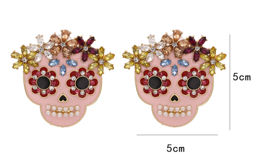 Who said skulls can't be feminine?  Our pink skull stud statement earrings are a must for that weekend BBQ or getting the office talking! 