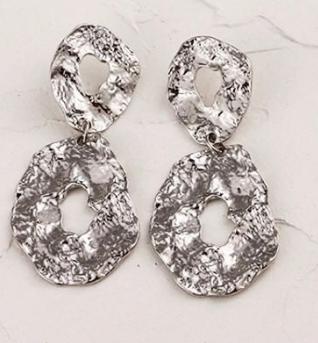 A pressed gold/silver abstract oval design. Lightweight. Versatile. Statement.