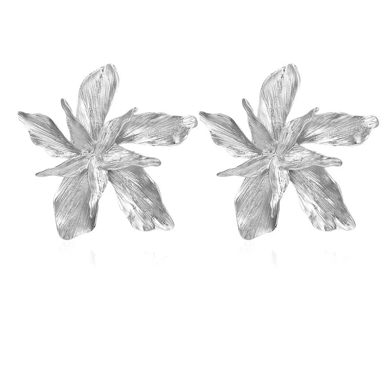 Meet Eve our overside stud backed statement flower earring, effortless and elegant.  Available in Gold or Silver.   All earrings arrive beautifully packaged in our luxurious Entire Me pouch. 